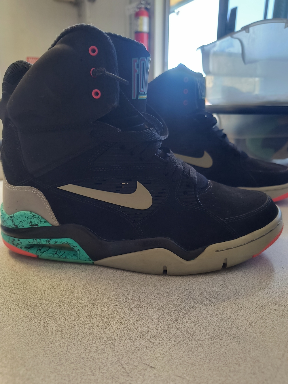 Nike Black High-Top Sneakers with Teal Accent
